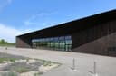 Dunkles Besucherzentrum mit breiter Glasfront im Museumsdorf Niedersulz